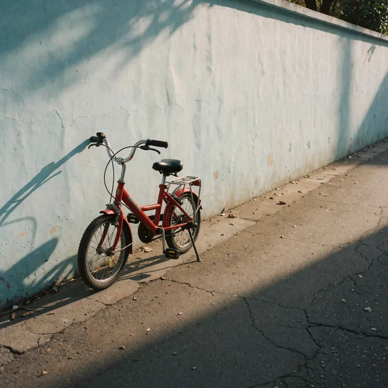A red bicycle leaning on a pale blue wall, image-to-image at denoise 0.2: almost identical to the source photo